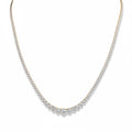 My Store 4 graduated Riviera diamond tennis necklace in gold with a three-prong setting and brilliant cut stones.