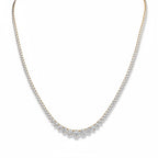 My Store 4 graduated Riviera diamond tennis necklace in gold with a three-prong setting and brilliant cut stones.