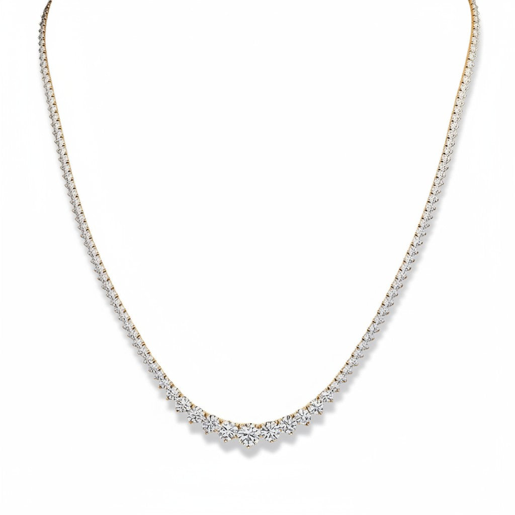 My Store 4 graduated Riviera diamond tennis necklace in gold with a three-prong setting and brilliant cut stones.