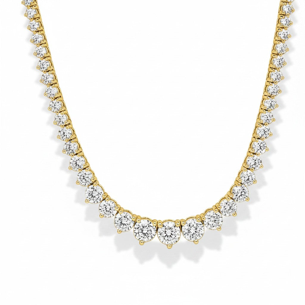 My Store 4 graduated Riviera diamond tennis necklace in 18K yellow gold with a delicate three-prong setting.