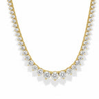 My Store 4 graduated Riviera diamond tennis necklace in 18K yellow gold with a delicate three-prong setting.