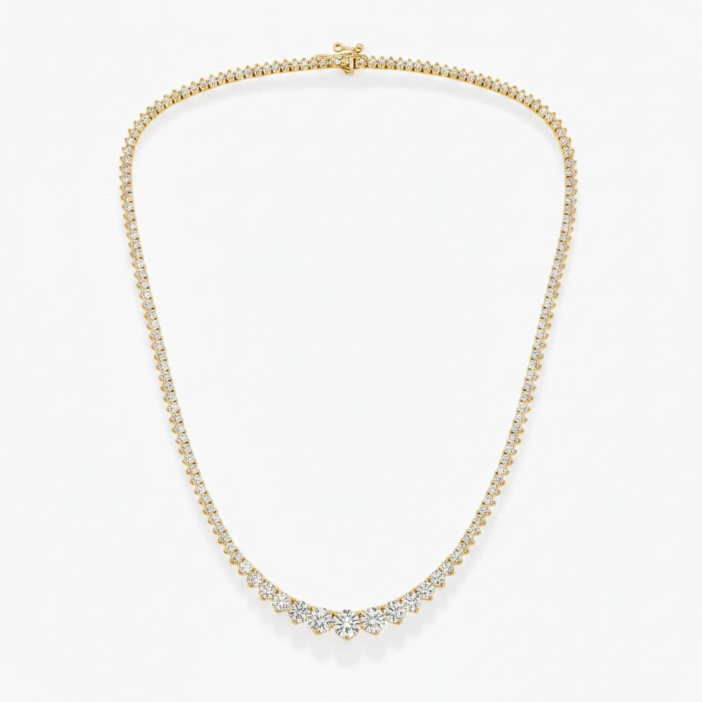 My Store 4 graduated Riviera diamond tennis necklace in 18K yellow gold with a three-prong setting.