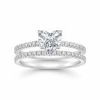 My Store 4 heart-cut diamond engagement ring and matching micro-pavé wedding band set in white gold.