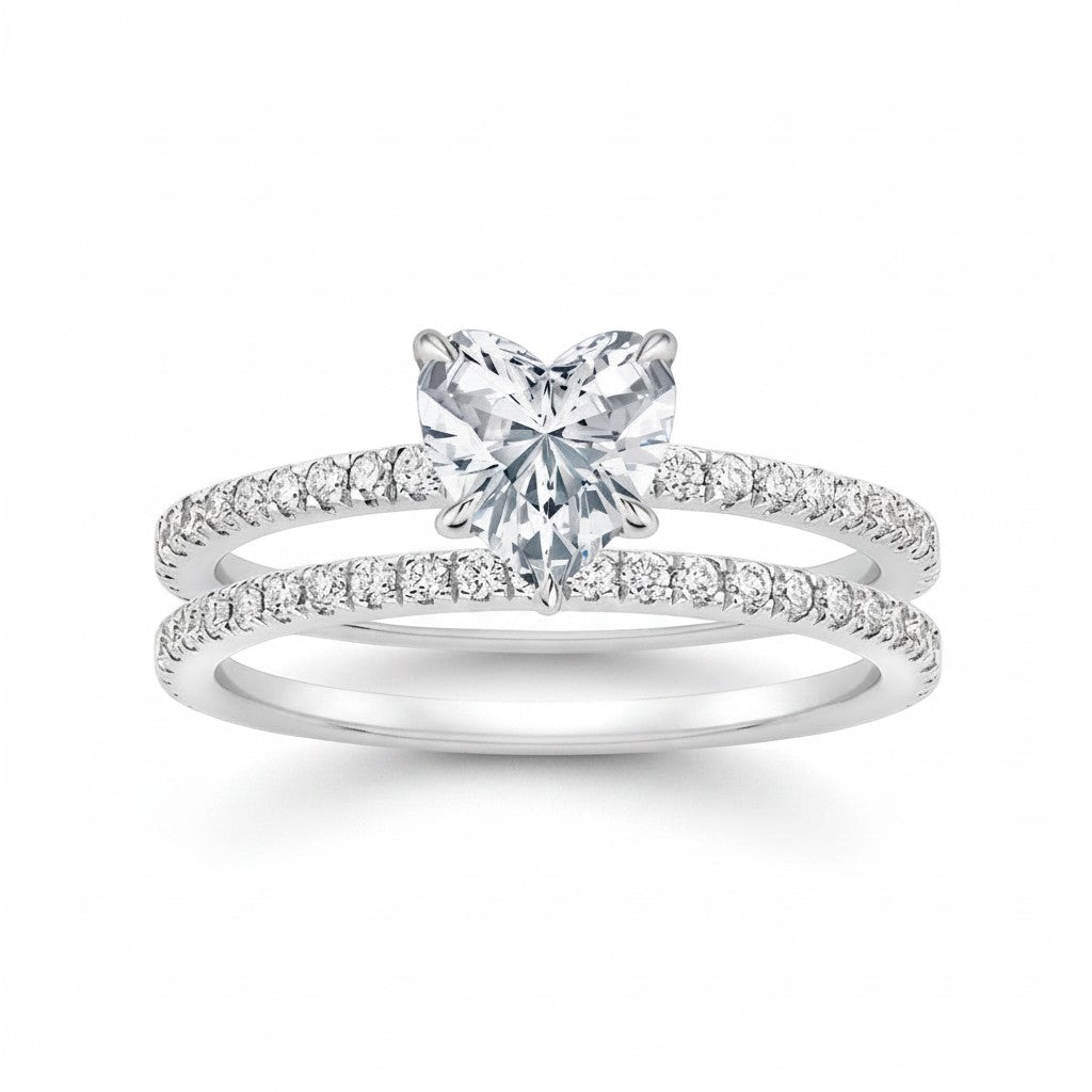 My Store 4 heart-cut diamond engagement ring and matching micro-pavé wedding band set in white gold.