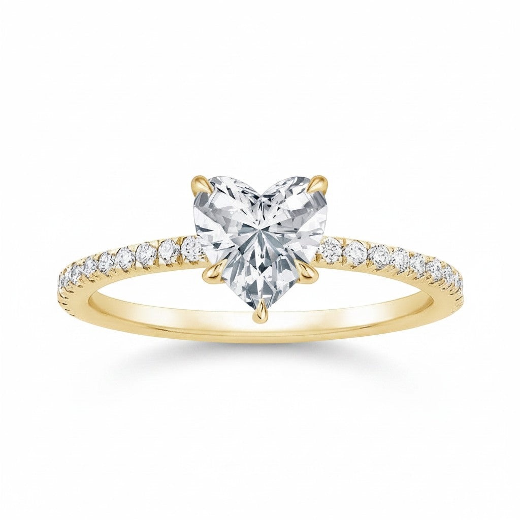My Store 4 heart-cut diamond engagement ring in 18K yellow gold with a micro-pavé band and protective V-prong setting.