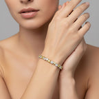 My Store 4 tennis bracelet featuring alternating fancy yellow and white heart-cut diamonds in two-tone gold settings.