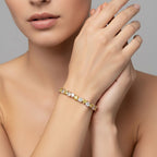 My Store 4 tennis bracelet featuring alternating fancy yellow and white heart-cut diamonds in two-tone gold settings.