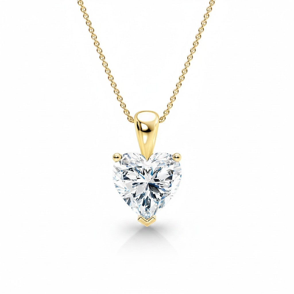 My Store 4 heart-cut diamond solitaire pendant necklace in 18K yellow gold with a delicate cable chain.