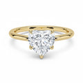 My Store 4 18K solid gold solitaire ring featuring a heart-shaped diamond set on a polished yellow gold band