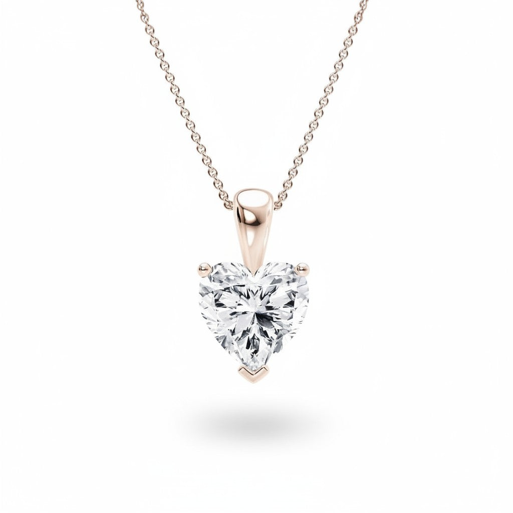 My Store 4 heart-cut diamond solitaire pendant necklace in 18K yellow gold with a delicate cable chain.