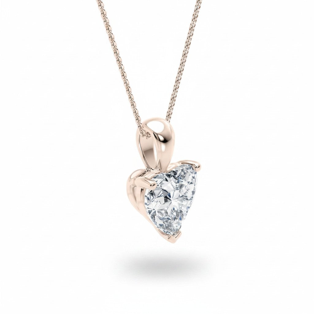 My Store 4 heart-cut diamond solitaire pendant necklace in rose gold with a polished tapered bail and fine cable chain.