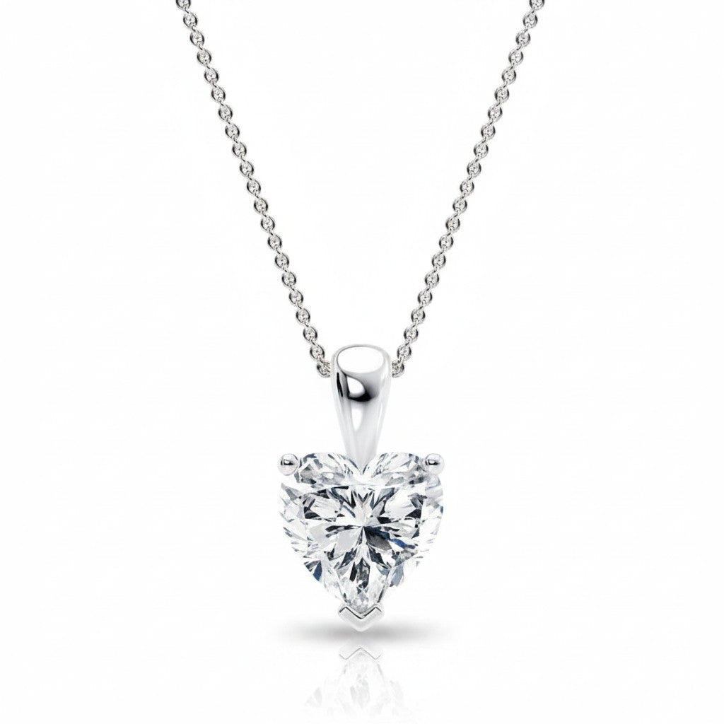My Store 4 heart-cut diamond solitaire pendant necklace in white gold on a delicate cable chain.