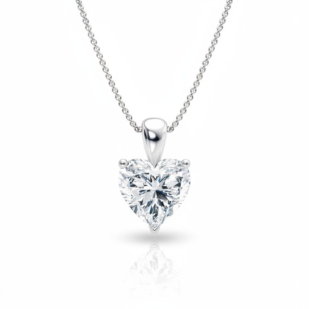 My Store 4 heart-cut diamond solitaire pendant necklace in white gold with a delicate cable chain.