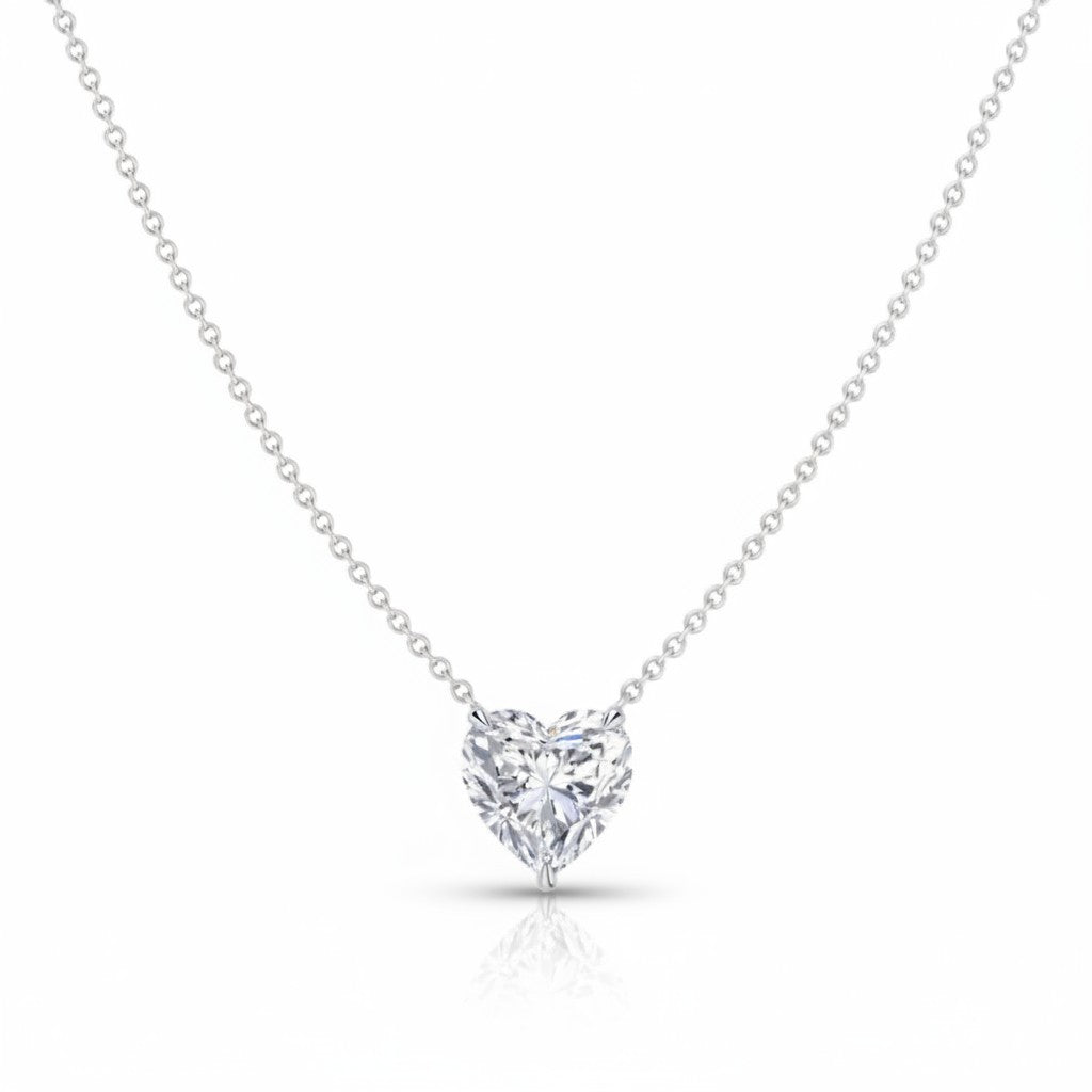 My Store 4 heart-cut diamond solitaire pendant necklace in white gold with a bail-free floating chain design.