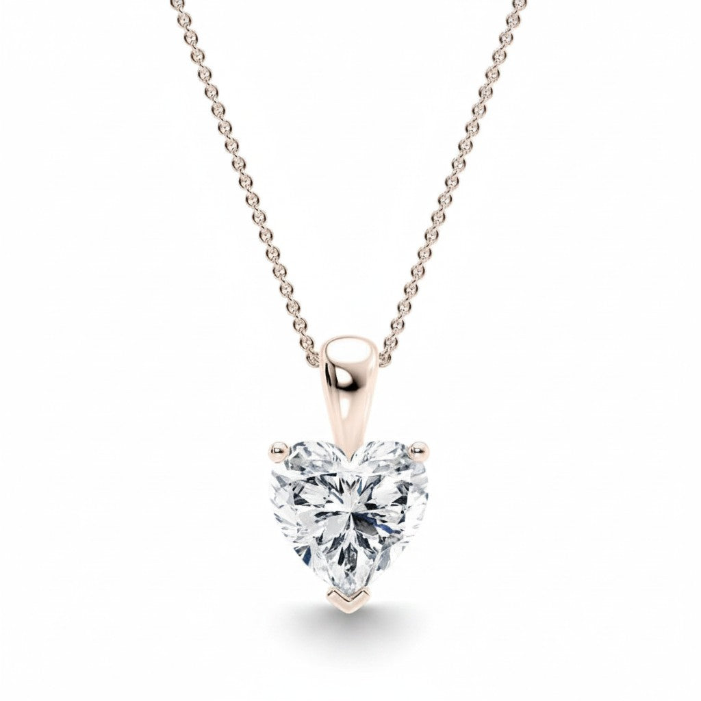 My Store 4 heart-cut diamond solitaire pendant necklace in 18K yellow gold on a delicate cable chain.