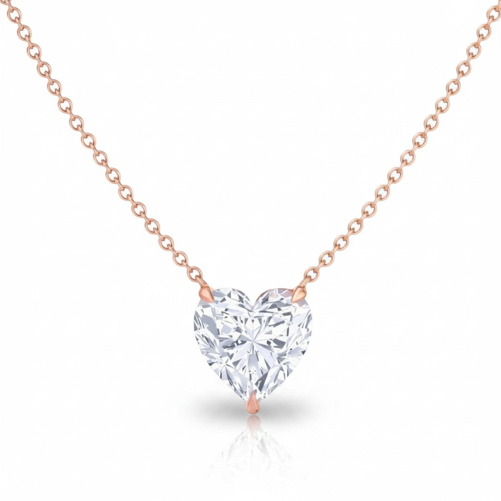 My Store 4 heart-cut diamond solitaire pendant necklace in rose gold with a bail-free floating setting on a fine chain.