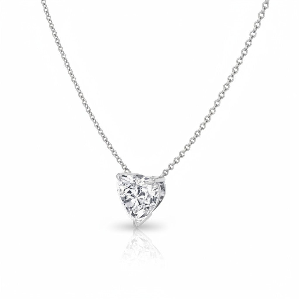 My Store 4 heart-cut diamond solitaire pendant necklace in white gold with a bail-free floating setting on a fine chain.