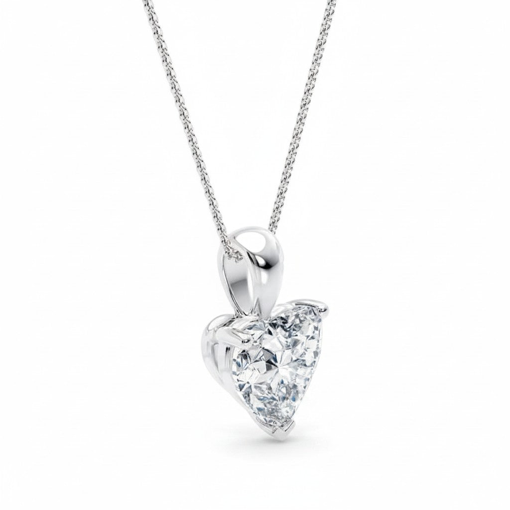 My Store 4 heart-cut diamond solitaire pendant necklace in white gold on a delicate cable chain.