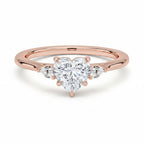 My Store 4 18K solid gold three stone engagement ring featuring a heart-shaped lab-grown diamond with side stones.