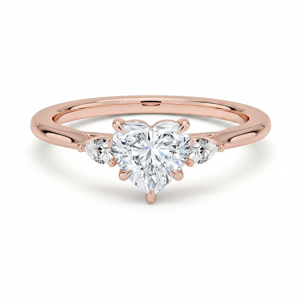 My Store 4 18K solid gold three stone engagement ring featuring a heart-shaped lab-grown diamond with side stones.