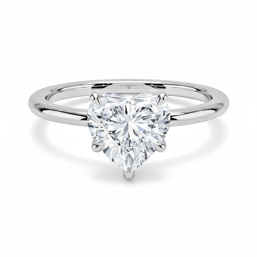 My Store 4 18K solid gold solitaire ring featuring a brilliant heart-shaped diamond on a polished band