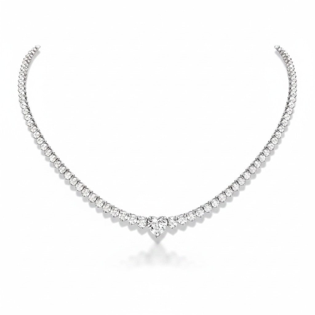 My Store 4 heart-shaped diamond solitaire tennis necklace in white gold with a continuous strand of round diamonds.