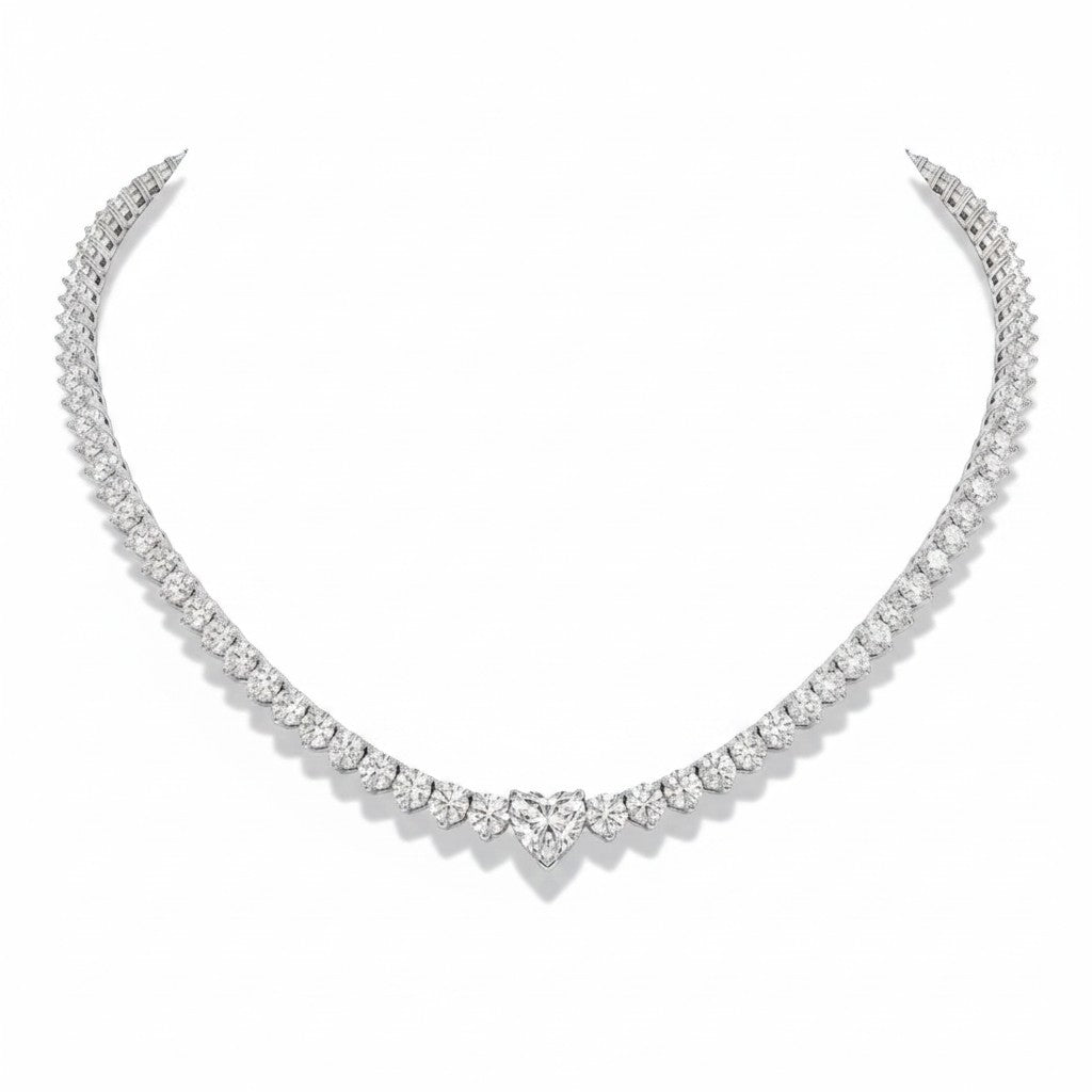 My Store 4 heart-shaped diamond solitaire tennis necklace in white gold with a continuous strand of brilliant diamonds.