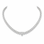 My Store 4 heart-shaped diamond solitaire tennis necklace in white gold with a continuous strand of brilliant diamonds.