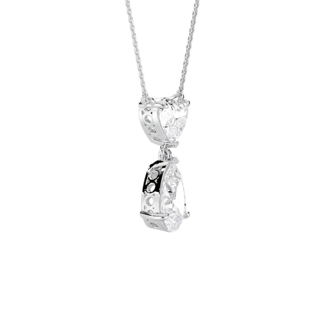 My Store 4 diamond pendant necklace featuring a heart-cut and pear-cut diamond drop in white gold with V-prong settings.