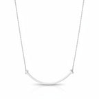 My Store 4 large smile diamond necklace in white gold with a curved bar and T-bar ends on a delicate trace chain.