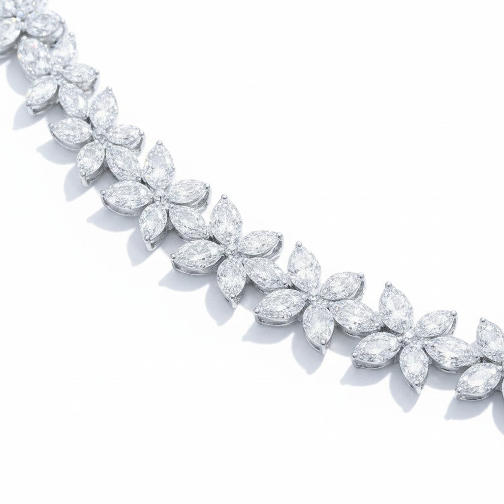 My Store 4 floral cluster necklace featuring a continuous strand of marquise-cut diamonds in 18K white gold settings.