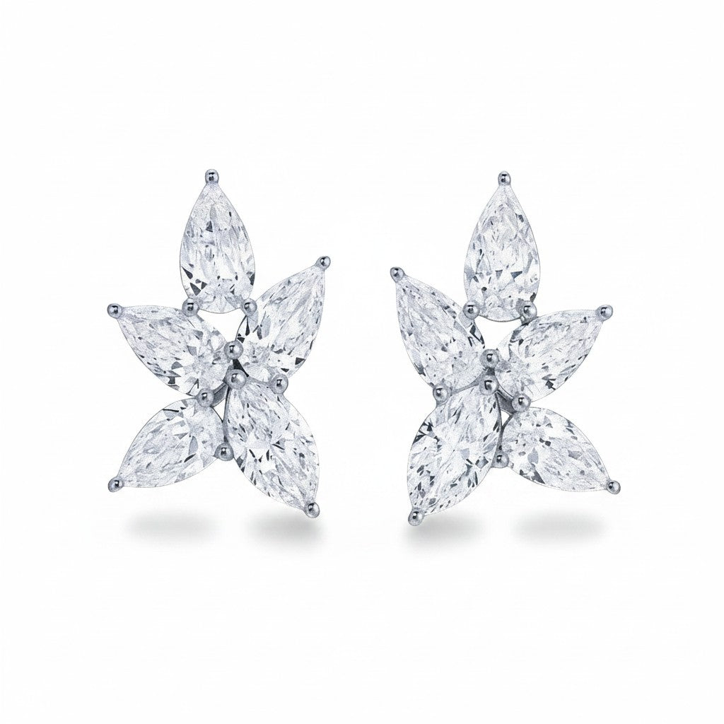 My Store 4 floral stud earrings featuring marquise-cut diamonds arranged in a five-petal flower cluster in white gold.