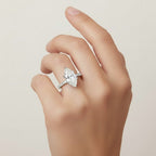My Store 4 18K solid gold marquise cut solitaire engagement ring with pavé diamond band worn on a woman's finger