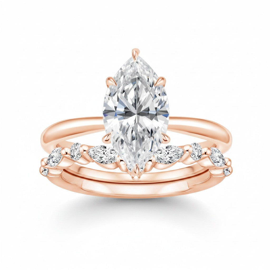 My Store 4 18K solid gold marquise lab-grown diamond ring set featuring a brilliant center stone and side accents.