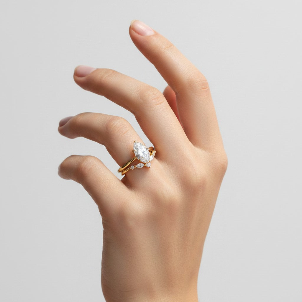 My Store 4 18K solid gold Antoinette marquise lab-grown diamond ring set worn on a woman's hand