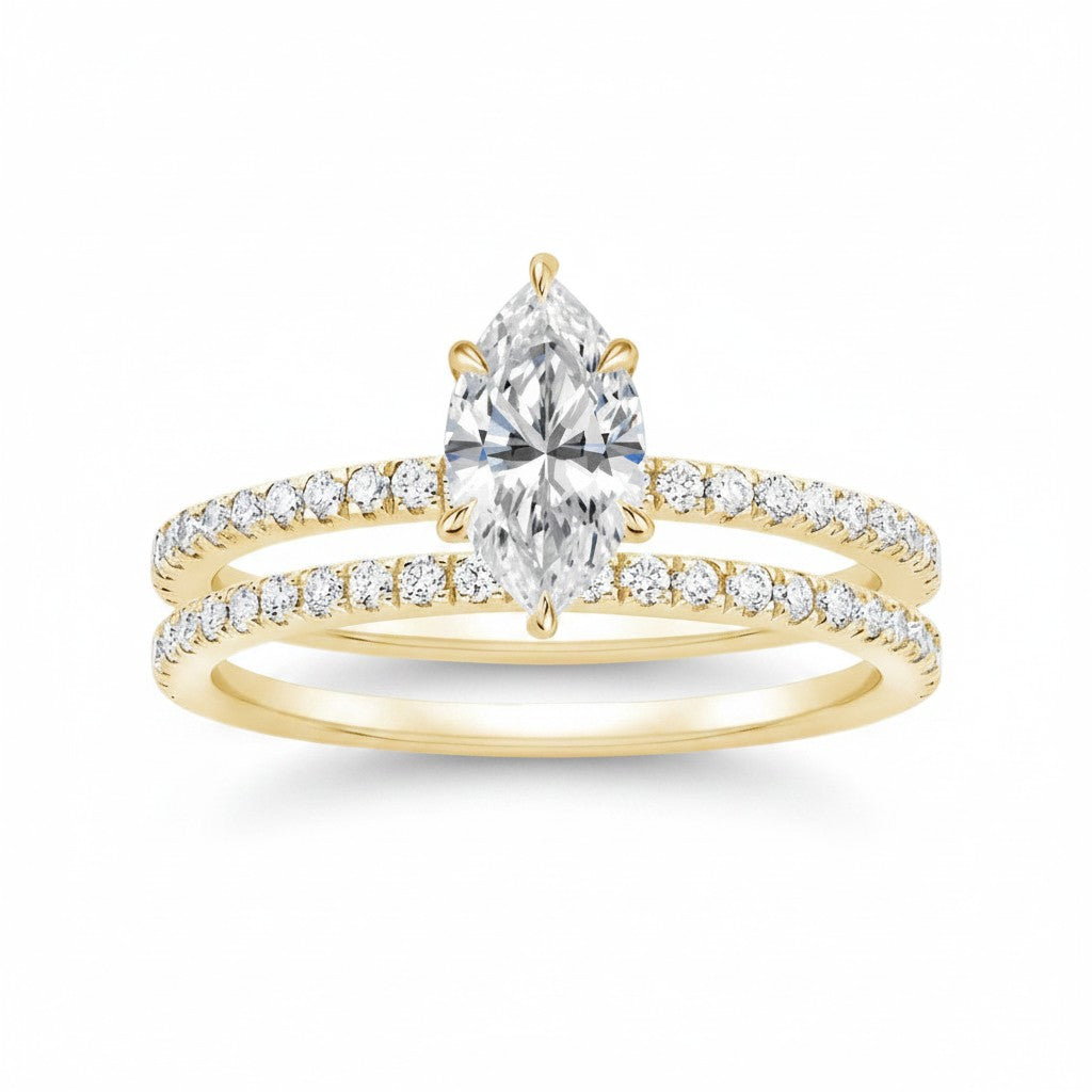 My Store 4 marquise diamond engagement ring and matching pavé wedding band set in 18K yellow gold.