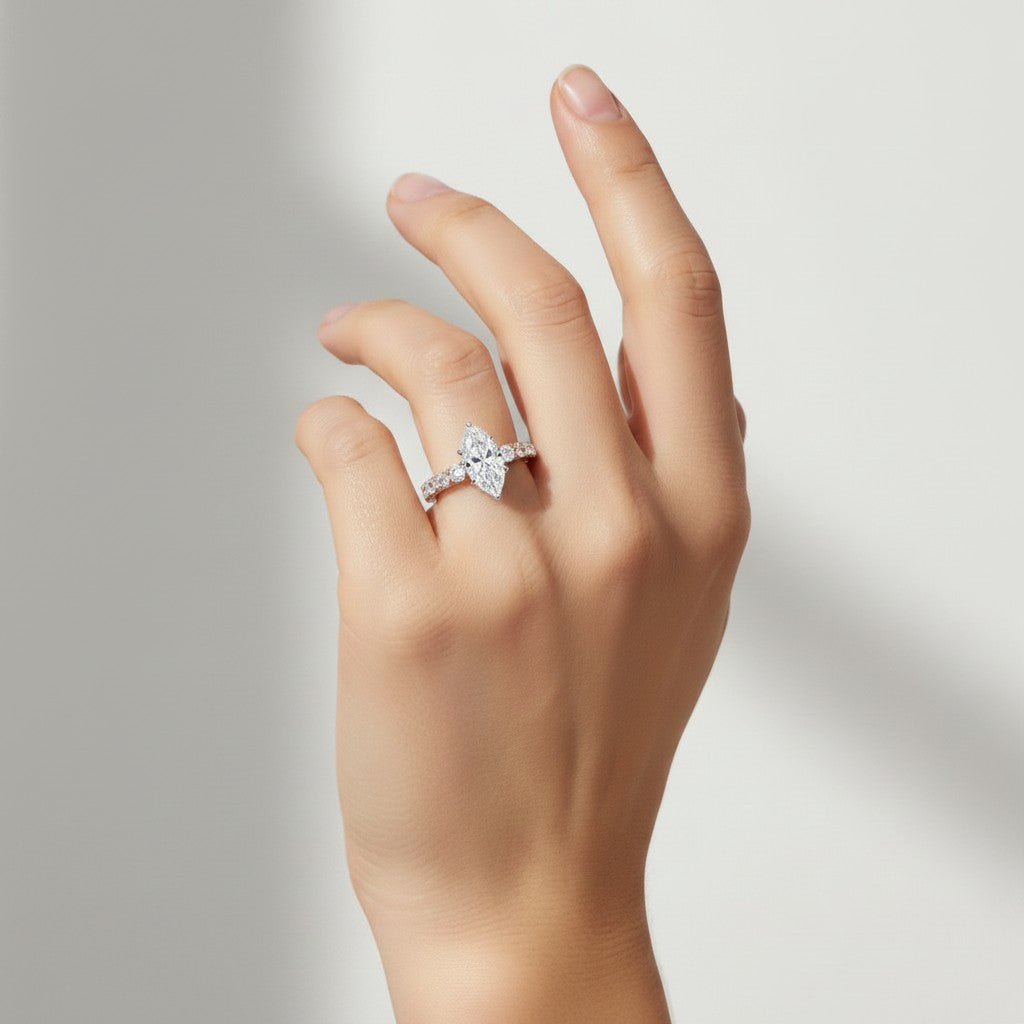 My Store 4 18K solid gold marquise lab diamond engagement ring set with pavé band worn on a woman's hand