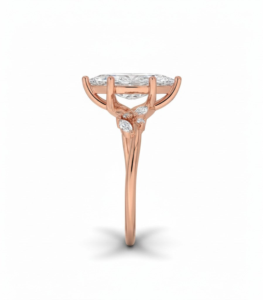 My Store 4 18K solid gold three-stone ring featuring a marquise lab-grown diamond in a side profile view