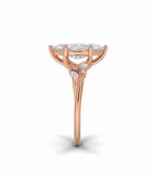 My Store 4 18K solid gold three-stone ring featuring a marquise lab-grown diamond in a side profile view