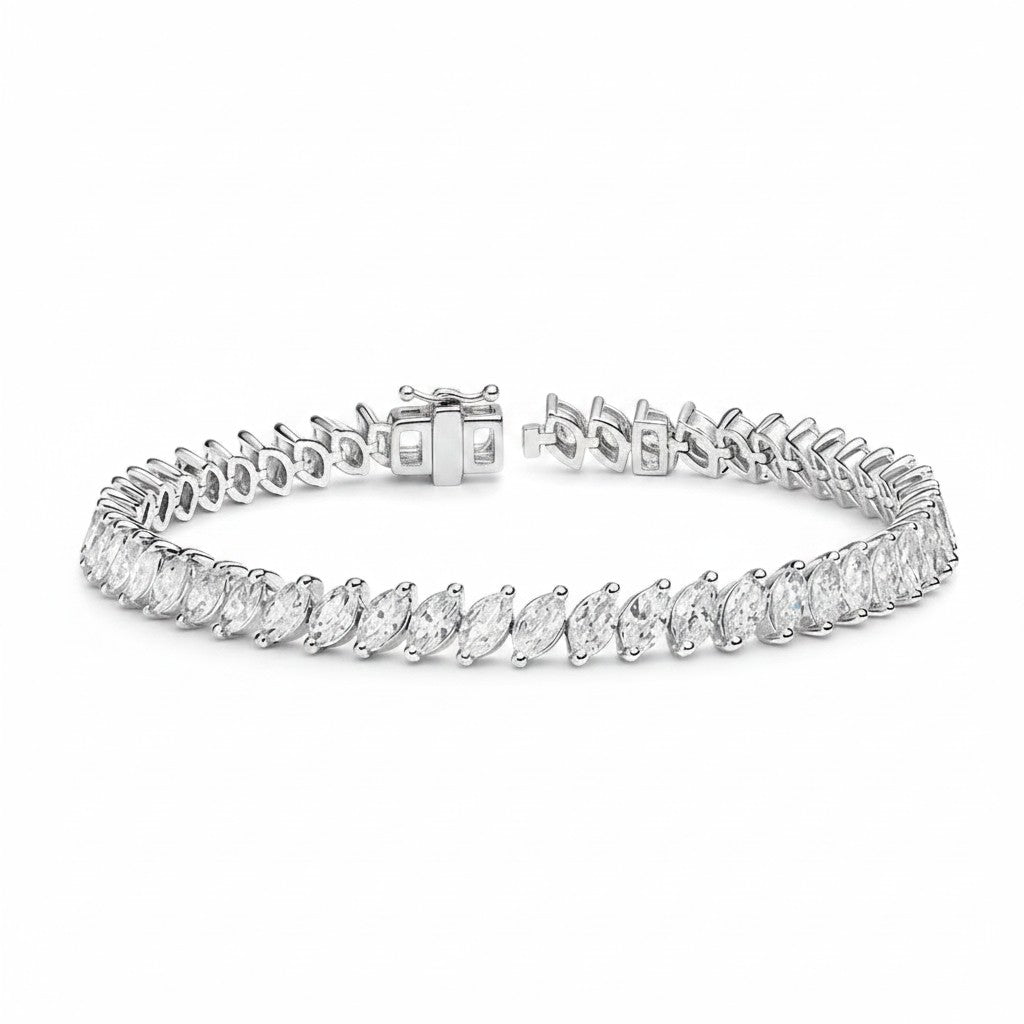 My Store 4 marquise cut diamond tennis bracelet in white gold with a secure box clasp and fluid link design.