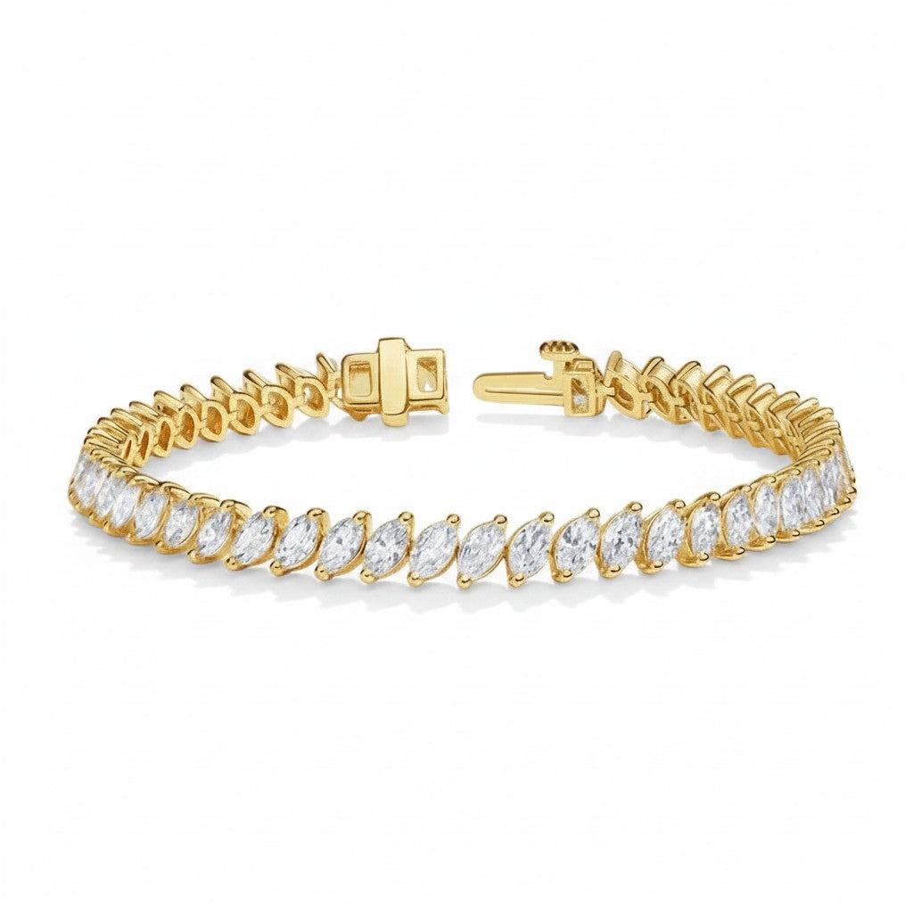 My Store 4 marquise cut diamond tennis bracelet in yellow gold with a secure box clasp and VVS1 E color stones.