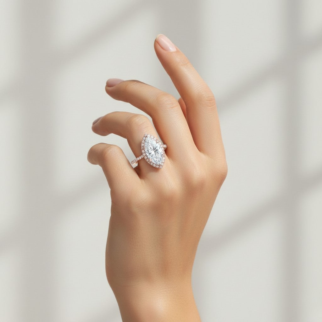My Store 4 18K solid gold marquise-cut lab diamond halo ring with pavé band worn on a woman's hand