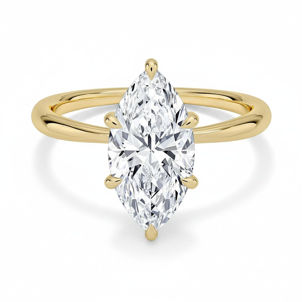 My Store 4 18K solid gold solitaire ring featuring a marquise-cut lab-grown diamond on a polished gold band.