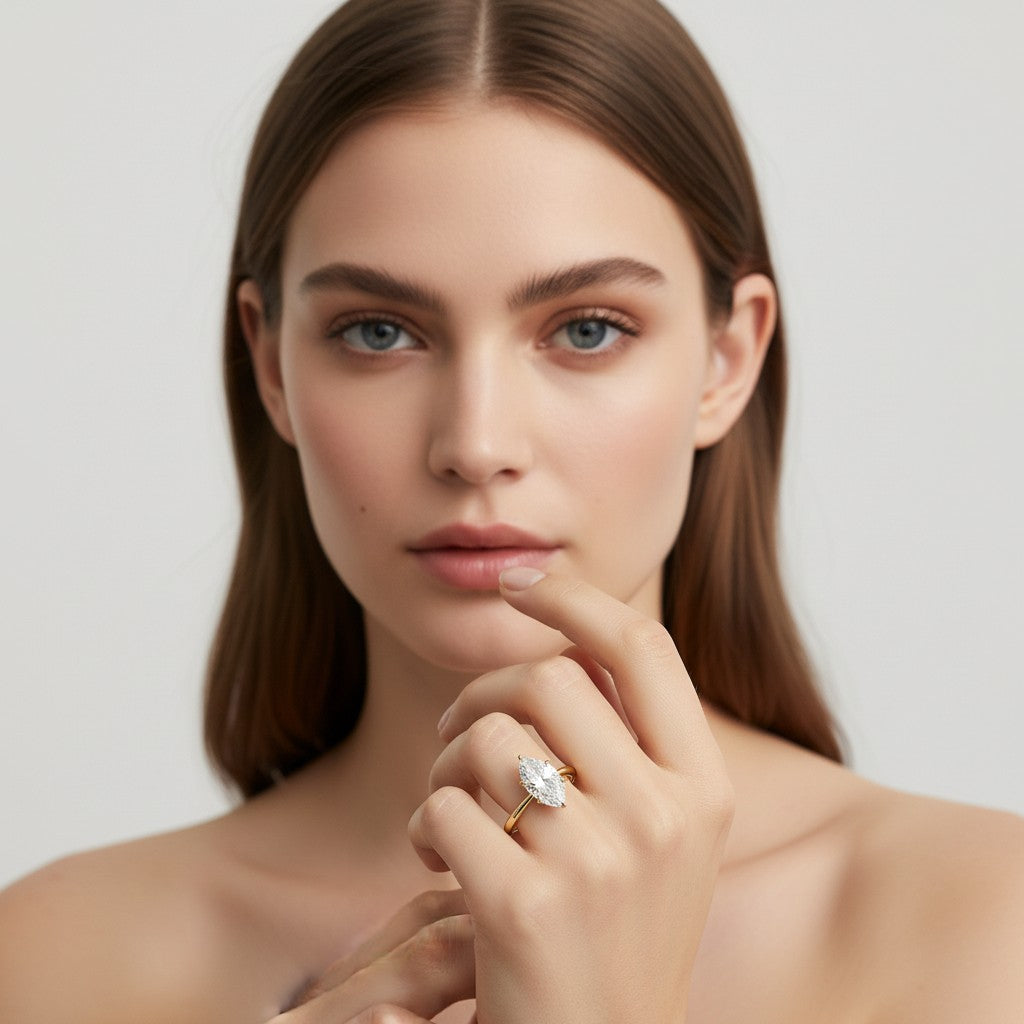 My Store 4 18K solid gold solitaire ring with a marquise-cut lab-grown diamond worn by a model
