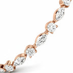 My Store 4 rose gold tennis bracelet featuring alternating marquise and round brilliant cut diamonds in a prong setting.