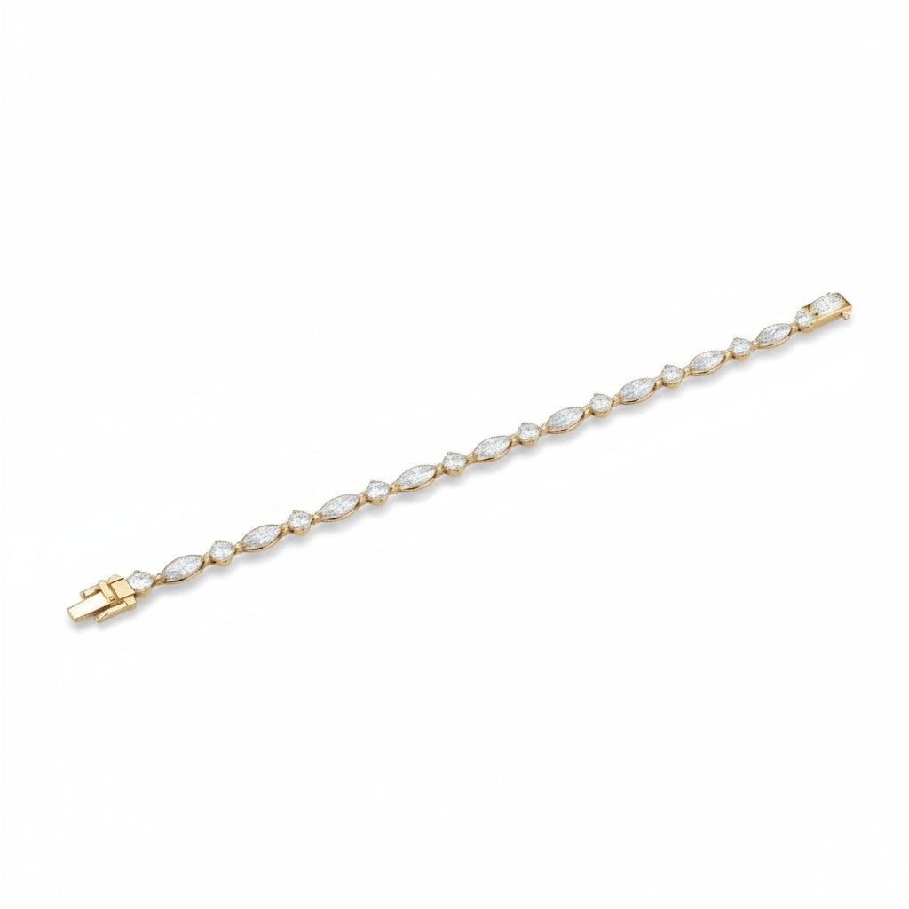 My Store 4 gold tennis bracelet featuring an alternating pattern of marquise and round brilliant cut diamonds.