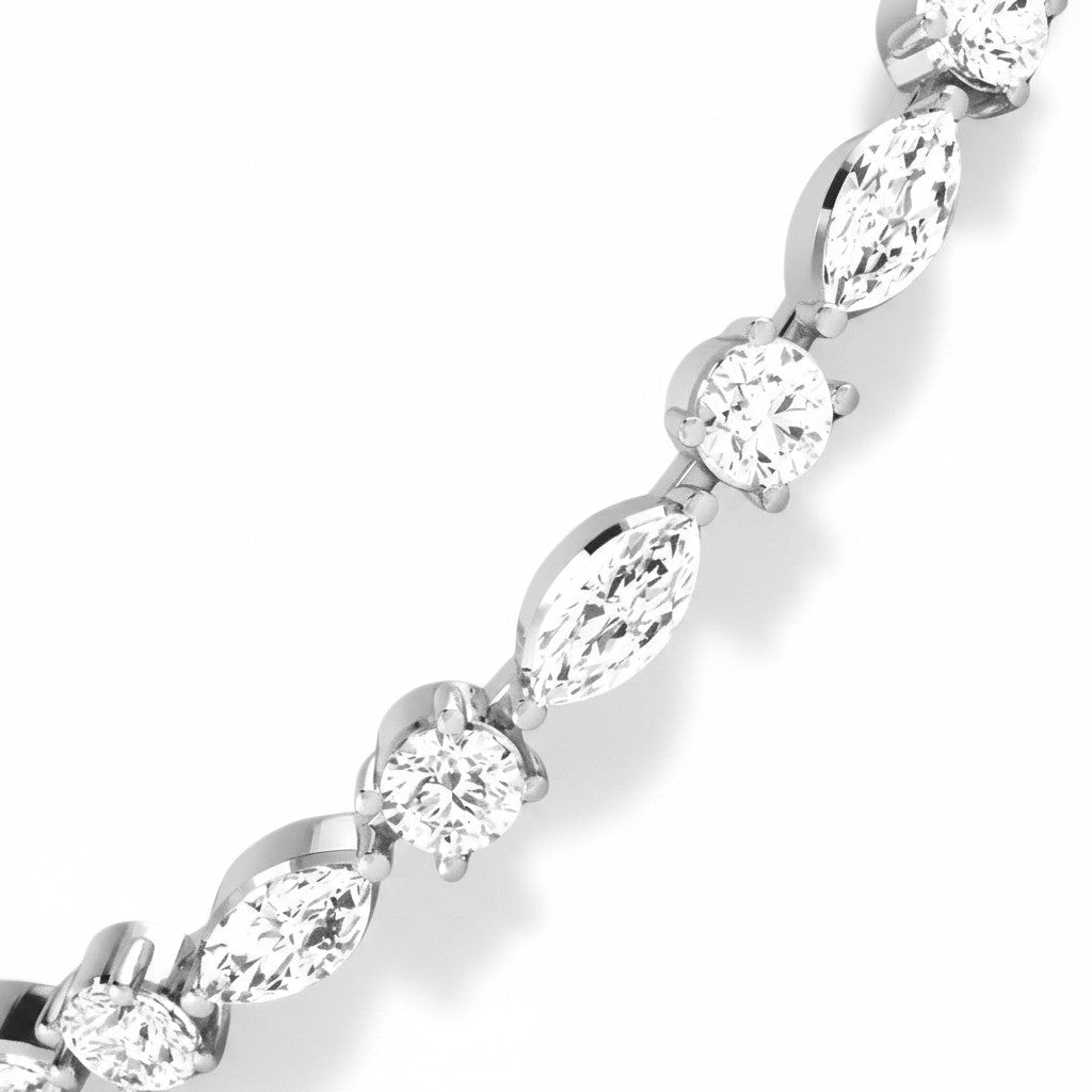 My Store 4 tennis bracelet featuring alternating marquise and round brilliant diamonds set in polished white gold.