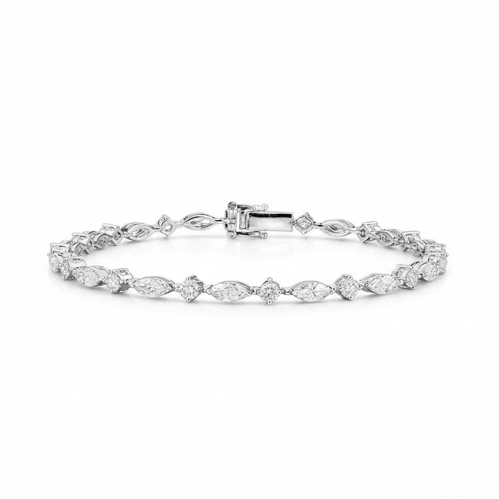 My Store 4 tennis bracelet featuring alternating marquise and round cut diamonds in a polished white gold setting.