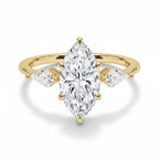 My Store 4 18K solid gold trilogy ring featuring a central marquise-cut lab-grown diamond with two pear-cut side stones.
