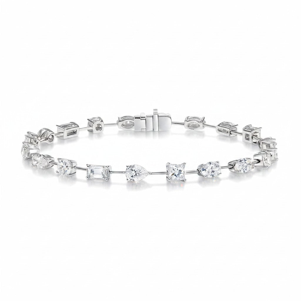 My Store 4 tennis bracelet featuring mixed fancy cut diamonds including pear, emerald, princess, and oval shapes.